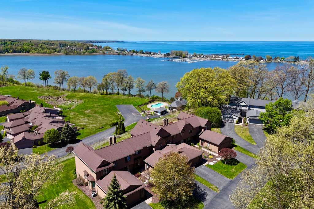 aerial wide photo of Stony Point Landing with Lake Ontario in distance